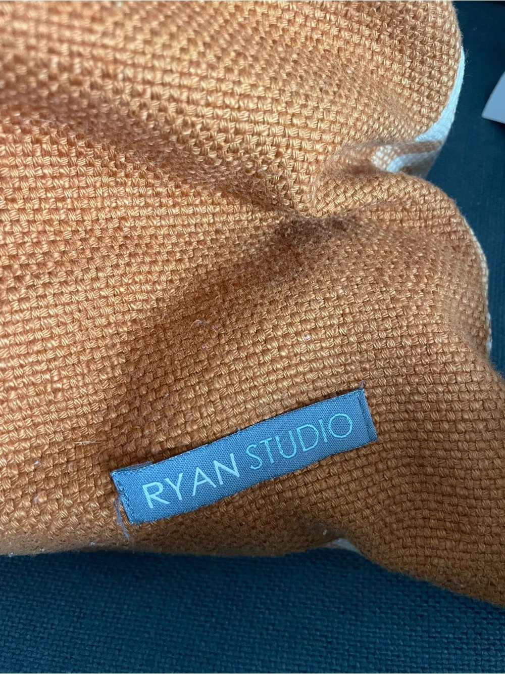Ryan Studio designed burnt orange botanical pillow cover